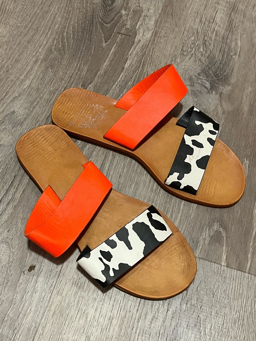 BAMBOO Neon Orange and Black-White Cow Print Slide Sandals